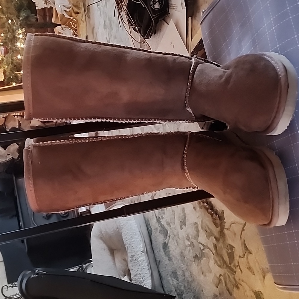 Ugg Australia boots tall slippers. Beand new never worn.